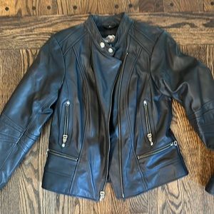 Women’s H-D black leather jacket. XS. Old school style. Very rarely worn.